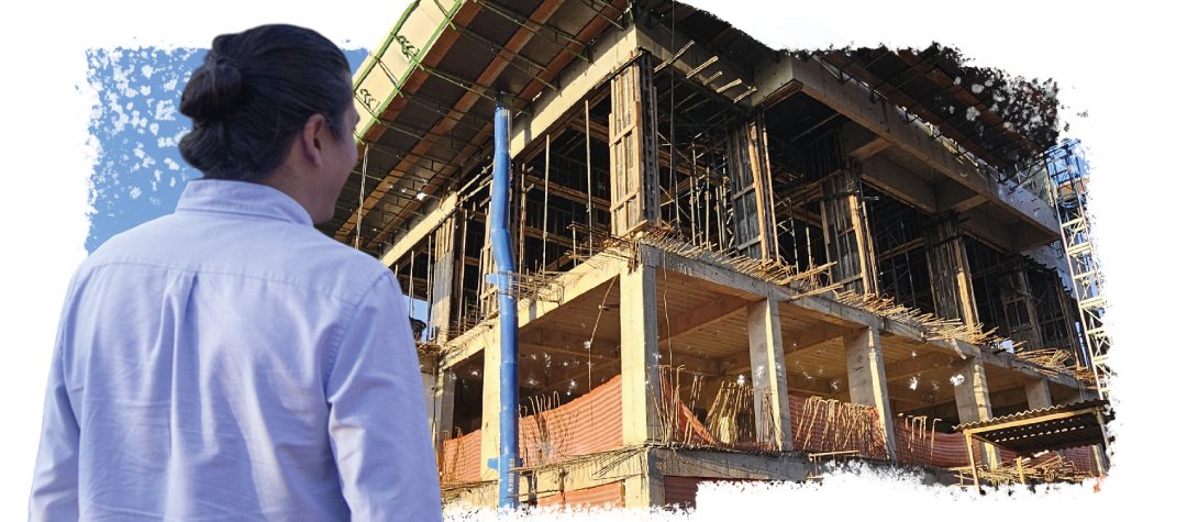 Pessoas olhando para uma construção